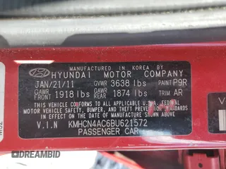 2011 Hyundai Accent GLS z VIN KMHCN4AC6BU621572, wystawiony jako Copart lot #57753025 z przebiegiem 108 395 mil mil oraz Szkoda całkowita • Salvage title. Historia ofert i sprzedaży dostępna na DreamBid. Obrazek 13.