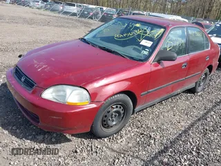 1997 Honda Civic LX z VIN 1HGEJ6671VL008531, wystawiony jako IAAI lot #42156980 z przebiegiem Nie podano mil oraz . Historia ofert i sprzedaży dostępna na DreamBid. Obrazek 2.