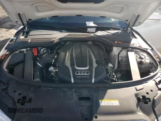 2015 Audi A8 4.0T with VIN WAUJ2AFD3FN005524, listed as a Copart auction lot 65610982 with 105,627 mi miles and . Bid and sale history available at DreamBid. Image 7.