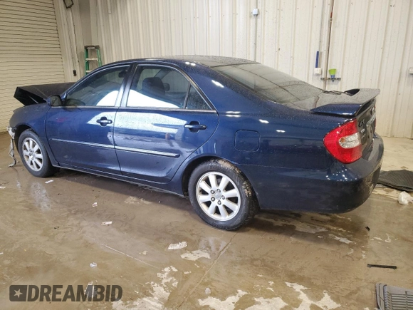 2003 Toyota Camry LE z VIN 4T1BF30K23U058761, wystawiony jako Copart lot #51286985 z przebiegiem 90 143 mil mil oraz Nie do naprawy • Non repairable. Historia ofert i sprzedaży dostępna na DreamBid. Obrazek 2.