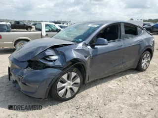 2023 Tesla Model Y Long Range z VIN 7SAYGDEE3PA078875, wystawiony jako Copart lot #55263255 z przebiegiem 53 303 mil mil oraz Szkoda całkowita • Salvage title. Historia ofert i sprzedaży dostępna na DreamBid. Obrazek 1.