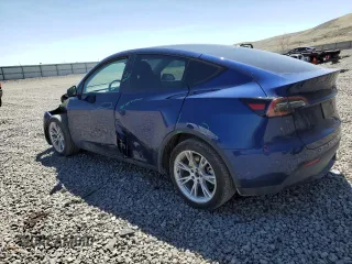 2023 Tesla Model Y Long Range with VIN 7SAYGDEE3PA106609, listed as a Copart auction lot 53839315 with 24,077 mi miles and Salvage Title. Bid and sale history available at DreamBid. Image 2.