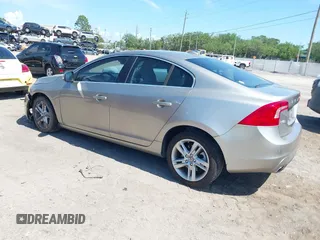 2015 Volvo S60 T5 Drive-E Premier Plus with VIN YV140MFC9F1318920, listed as a IAAI auction lot 41930684 with 66,790 mi miles. Bid and sale history available at carsss.com. Image 3.