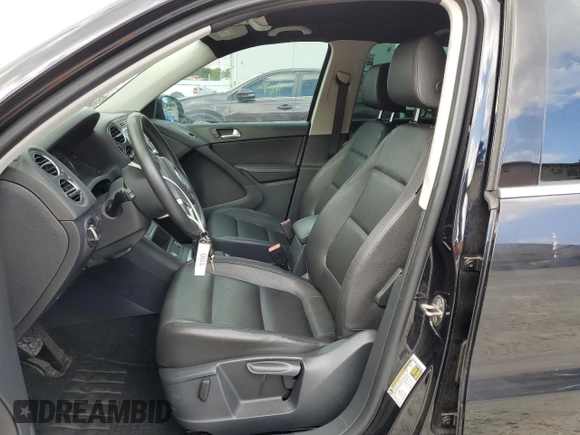 2014 Volkswagen Tiguan SE with VIN WVGAV3AXXEW543245, listed as a Copart auction lot 42288905 with 92,851 mi miles and Salvage title. Bid and sale history available at DreamBid. Image 7.
