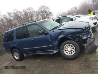 2000 Ford Explorer XLT z VIN 1FMZU73X0YZC01123, wystawiony jako IAAI lot #41487199 z przebiegiem 143 697 mil mil oraz . Historia ofert i sprzedaży dostępna na DreamBid. Obrazek 13.