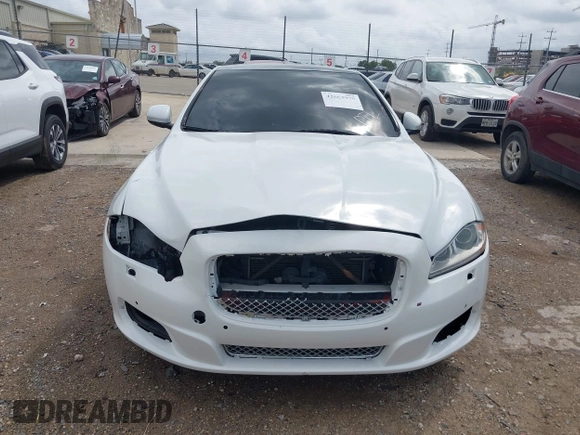 2014 Jaguar XJ R with VIN SAJWA1EK3EMV58692, listed as a IAAI auction lot 42663979 with 111,386 mi miles and . Bid and sale history available at DreamBid. Image 12.