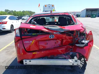 2022 Toyota Prius L Eco with VIN JTDKAMFU6N3158307, listed as a IAAI auction lot 42042768 with 17,882 mi miles and . Bid and sale history available at DreamBid. Image 17.