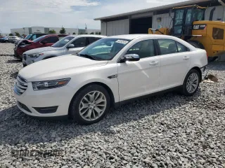 2016 Ford Taurus Limited with VIN 1FAHP2F85GG140107, listed as a Copart auction lot 66093895 with 72,614 mi miles and Salvage title. Bid and sale history available at DreamBid. Image 1.