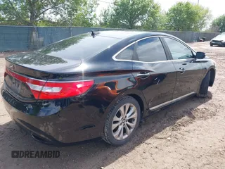 2014 Hyundai Azera with VIN KMHFG4JG3EA354276, listed as a IAAI auction lot 41892879 with 114,147 mi miles and . Bid and sale history available at carsss.com. Image 4.