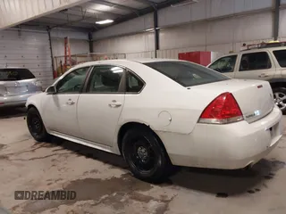 2012 Chevrolet Impala Police Police with VIN 2G1WD5E37C1258225, listed as a IAAI auction lot 41559049 with 202,535 mi miles. Bid and sale history available at carsss.com. Image 14.