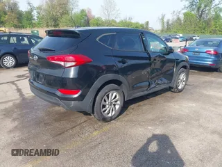2017 Hyundai Tucson SE with VIN KM8J23A49HU261130, listed as a IAAI auction lot 42093943 with 104,680 mi miles and . Bid and sale history available at DreamBid. Image 4.