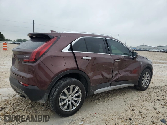 2023 Cadillac XT4 FWD Premium Luxury with VIN 1GYFZCR48PF100078, listed as a Copart auction lot 55955865 with 23,509 mi miles and Salvage title. Bid and sale history available at DreamBid. Image 3.