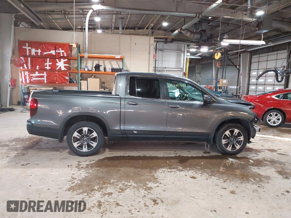 2019 Honda Ridgeline RTL with VIN 5FPYK2F54KB005791, listed as a IAAI auction lot 41285980 with 49,729 mi miles and . Bid and sale history available at DreamBid. Image 14.