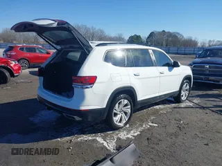 2021 Volkswagen Atlas SE z VIN 1V2WR2CA4MC514968, wystawiony jako IAAI lot #41414547 z przebiegiem 133 946 mil mil oraz . Historia ofert i sprzedaży dostępna na DreamBid. Obrazek 4.