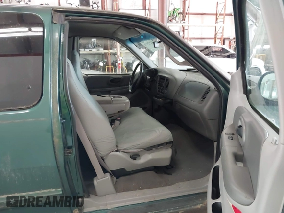 1999 Ford F-150 with VIN 1FTZX1729XNA06022, listed as a IAAI auction lot 42575958 with Not provided miles and . Bid and sale history available at DreamBid. Image 5.