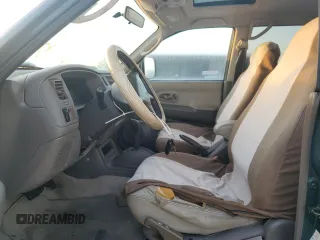 1999 Mitsubishi Montero Limited z VIN JA4LS41RXXP010154, wystawiony jako Copart lot #77666734 z przebiegiem Nie podano mil oraz Szkoda całkowita • Salvage title. Historia ofert i sprzedaży dostępna na DreamBid. Obrazek 7.