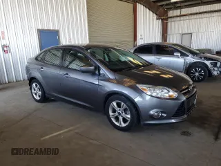2012 Ford Focus SE with VIN 1FAHP3F28CL114572, listed as a Copart auction lot 63053035 with 142,994 mi miles and Salvage title. Bid and sale history available at DreamBid. Image 4.
