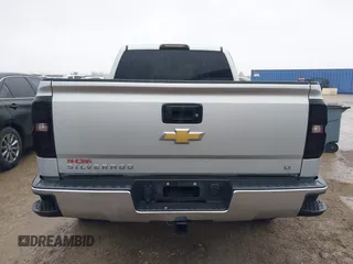2018 Chevrolet Silverado 1500 LT with VIN 1GCRCREC4JZ287085, listed as a IAAI auction lot 41450057 with 79,275 mi miles and . Bid and sale history available at DreamBid. Image 16.