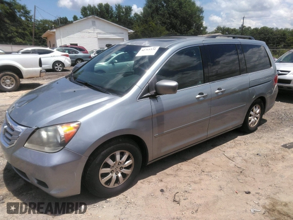 2010 Honda Odyssey EX-L z VIN 5FNRL3H74AB104446, wystawiony jako IAAI lot #42765331 z przebiegiem 319 510 mil mil oraz . Historia ofert i sprzedaży dostępna na DreamBid. Obrazek 2.