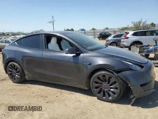 2024 Tesla Model Y Performance z VIN 7SAYGDEF0RF024089, wystawiony jako Copart lot #53981865 z przebiegiem Nie podano mil oraz Szkoda całkowita • Salvage title. Historia ofert i sprzedaży dostępna na DreamBid. Obrazek 4.