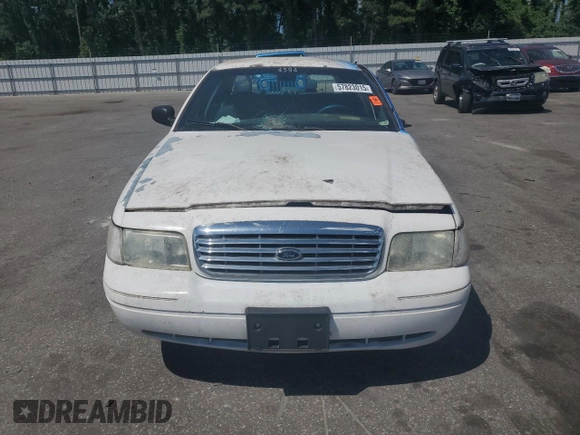 2002 Ford Police Interceptor Street Appear z VIN 2FAFP71WX2X132050, wystawiony jako Copart lot #57823015 z przebiegiem 152 391 mil mil oraz Szkoda całkowita • Salvage title. Historia ofert i sprzedaży dostępna na DreamBid. Obrazek 5.