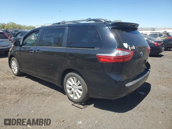 2015 Toyota Sienna Limited with VIN 5TDDK3DC6FS108792, listed as a Copart auction lot 55201005 with 98,616 mi miles and Salvage Title. Bid and sale history available at DreamBid. Image 2.