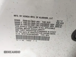 2017 Honda Pilot Touring with VIN 5FNYF6H9XHB034001, listed as a IAAI auction lot 42092549 with 142,422 mi miles and . Bid and sale history available at DreamBid. Image 9.