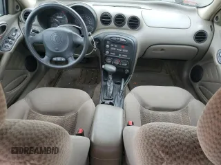 2003 Pontiac Grand Am SE1 with VIN 1G2NF52E23M509356, listed as a Copart auction lot 72323454 with 106,087 mi miles and Salvage Title. Bid and sale history available at carsss.com. Image 8.