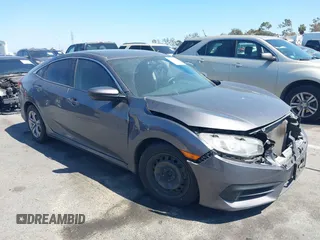 2017 Honda Civic LX z VIN 2HGFC2F56HH525914, wystawiony jako IAAI lot #42190331 z przebiegiem 139 464 mil mil oraz . Historia ofert i sprzedaży dostępna na DreamBid. Obrazek 1.