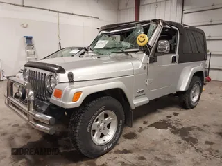 2005 Jeep Wrangler Unlimited with VIN 1J4FA44S05P359173, listed as a IAAI auction lot 41275179 with 75,035 mi miles. Bid and sale history available at carsss.com. Image 2.