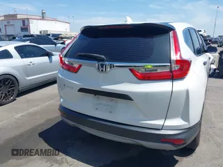 2019 Honda CR-V LX with VIN 2HKRW5H33KH407463, listed as a IAAI auction lot 42034584 with 85,454 mi miles and . Bid and sale history available at DreamBid. Image 17.