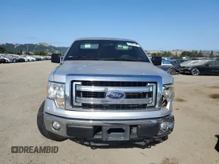 2014 Ford F-150 XL with VIN 1FTFW1EF5EKE57295, listed as a Copart auction lot 61687195 with 123,852 mi miles and Salvage title. Bid and sale history available at DreamBid. Image 5.