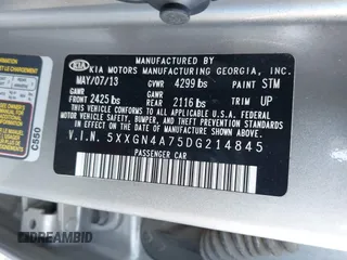 2013 Kia Optima EX with VIN 5XXGN4A75DG214845, listed as a IAAI auction lot 42026630 with 161,476 mi miles. Bid and sale history available at carsss.com. Image 9.