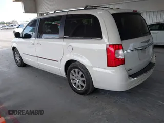 2013 Chrysler Town & Country Touring with VIN 2C4RC1BG0DR675406, listed as a IAAI auction lot 42119645 with 166,679 mi miles and . Bid and sale history available at DreamBid. Image 3.
