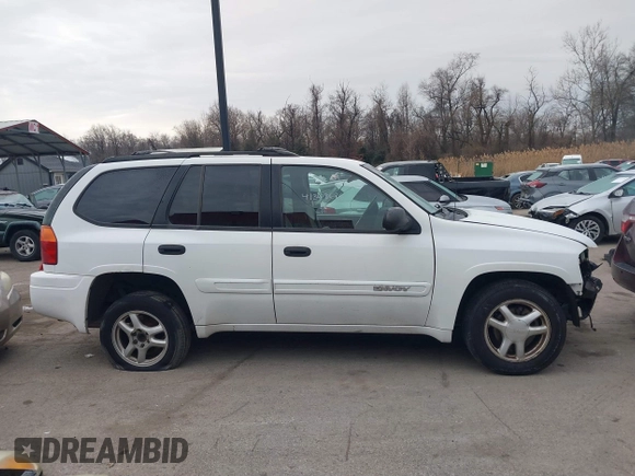 2005 GMC Envoy SLT with VIN 1GKDT13S952190876, listed as a IAAI auction lot 41308686 with 244,774 mi miles. Bid and sale history available at carsss.com. Image 14.