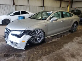 2018 Audi A7 Premium Plus with VIN WAUW3AFC1JN032336, listed as a Copart auction lot 58100635 with 36,976 mi miles and Salvage title. Bid and sale history available at DreamBid. Image 1.