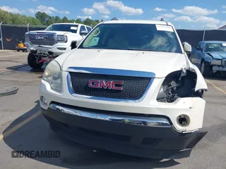 2011 GMC Acadia SLT2 with VIN 1GKKRSED1BJ235224, listed as a IAAI auction lot 42307216 with 158,126 mi miles and . Bid and sale history available at DreamBid. Image 12.