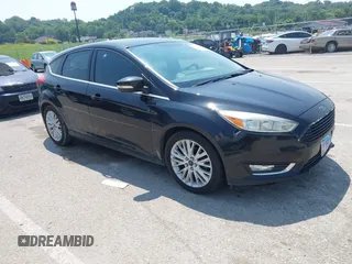 2015 Ford Focus Titanium with VIN 1FADP3N27FL219978, listed as a IAAI auction lot 42433005 with 175,459 mi miles and . Bid and sale history available at DreamBid. Image 1.