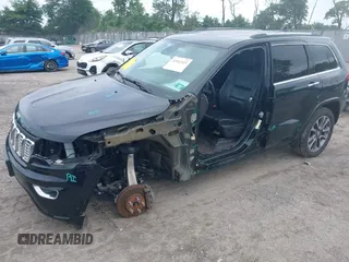 2018 Jeep Grand Cherokee High Altitude with VIN 1C4RJFCG0JC314389, listed as a IAAI auction lot 42512327 with 38,033 mi miles and . Bid and sale history available at DreamBid. Image 2.