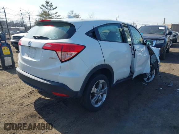 2018 Honda HR-V LX with VIN 3CZRU6H32JM722057, listed as a IAAI auction lot 41804600 with 100,468 mi miles. Bid and sale history available at carsss.com. Image 4.