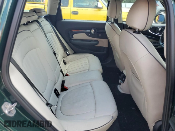 2016 MINI Clubman z VIN WMWLN5C5XG2E29275, wystawiony jako Copart lot #68162014 z przebiegiem 79 754 mil mil oraz Nie do naprawy. Historia ofert i sprzedaży dostępna na DreamBid. Obrazek 10.