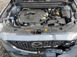 2024 Mazda CX-5 S Carbon Edition z VIN JM3KFBCM4R0392759, wystawiony jako Copart lot #45571245 z przebiegiem 7594 mil mil oraz Szkody całkowita. Historia ofert i sprzedaży dostępna na DreamBid. Obrazek 13.