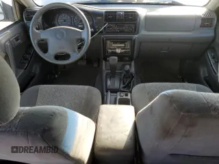 2001 Isuzu Rodeo S z VIN 4S2DM58W114306215, wystawiony jako Copart lot #85287914 z przebiegiem 157 844 mil mil oraz Szkoda całkowita • Salvage title. Historia ofert i sprzedaży dostępna na DreamBid. Obrazek 8.