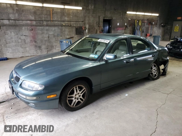 2000 Mazda Millenia z VIN JM1TA2212Y1610919, wystawiony jako Copart lot #80375014 z przebiegiem 127 938 mil mil oraz Szkoda całkowita • Salvage title. Historia ofert i sprzedaży dostępna na DreamBid. Obrazek 1.