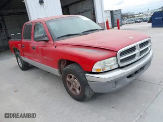 2002 Dodge Dakota SLT with VIN 1B7HL48X92S664369, listed as a IAAI auction lot 41911507 with 219,445 mi miles. Bid and sale history available at carsss.com. Image 1.