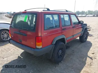 1998 Jeep Cherokee Sport with VIN 1J4FJ68SXWL164891, listed as a IAAI auction lot 42814173 with 162,986 mi miles and . Bid and sale history available at DreamBid. Image 4.