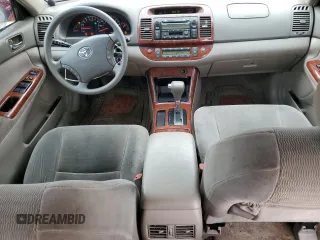 2005 Toyota Camry LE with VIN 4T1BE30KX5U086586, listed as a Copart auction lot 60291715 with 180,421 mi miles and Salvage title. Bid and sale history available at DreamBid. Image 8.