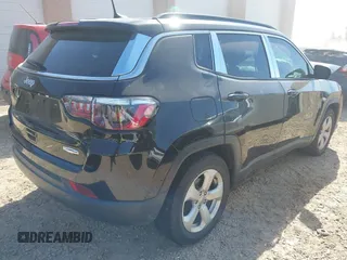 2021 Jeep Compass Latitude with VIN 3C4NJCBB4MT532251, listed as a IAAI auction lot 41889321 with 52,295 mi miles and . Bid and sale history available at DreamBid. Image 4.