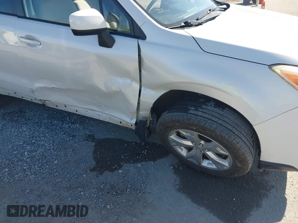2014 Subaru Forester Premium with VIN JF2SJAEC1EH447400, listed as a IAAI auction lot 42532127 with 128,173 mi miles and . Bid and sale history available at DreamBid. Image 6.