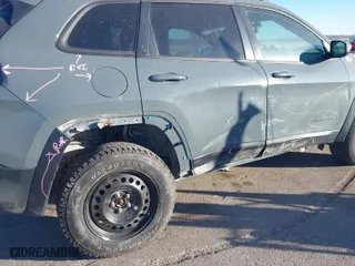 2015 Jeep Cherokee Trailhawk with VIN 1C4PJMBB5FW540094, listed as a IAAI auction lot 41440568 with 191,852 mi miles. Bid and sale history available at carsss.com. Image 6.